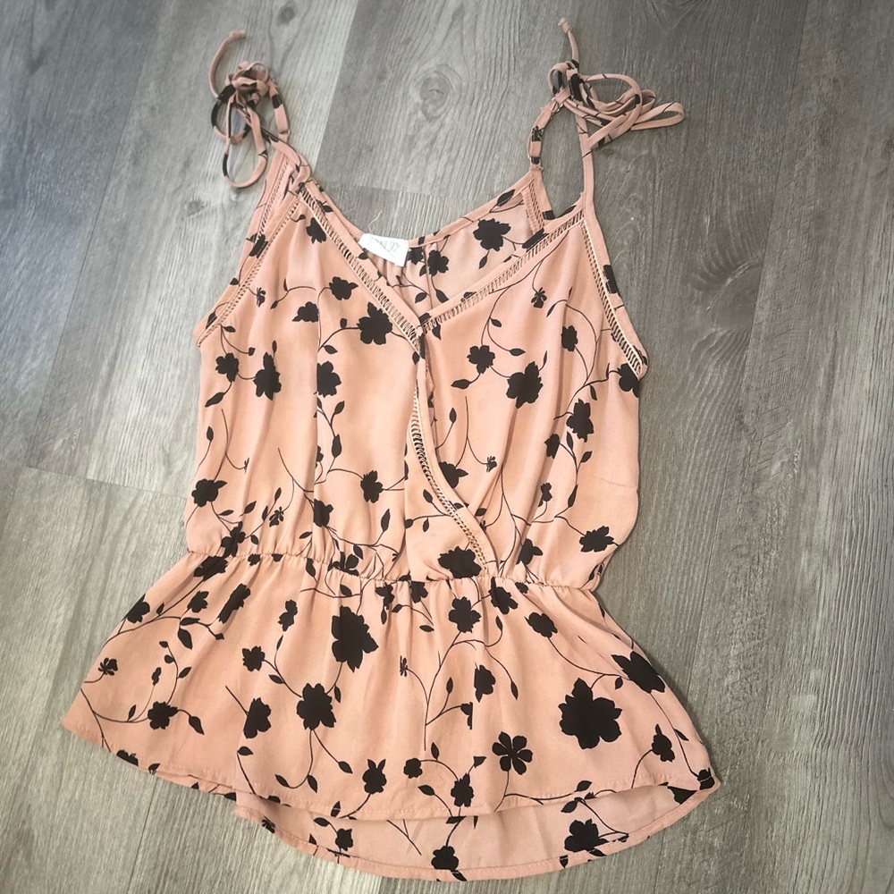 Woman’s pink and black floral Sienna Sky tank top